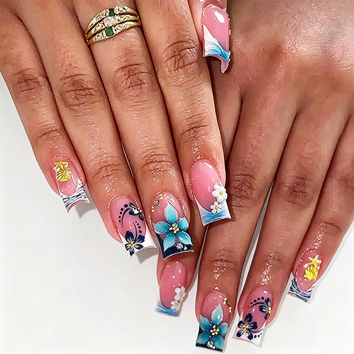 Artificial nails in creative floral design with glitter accents Bowlift