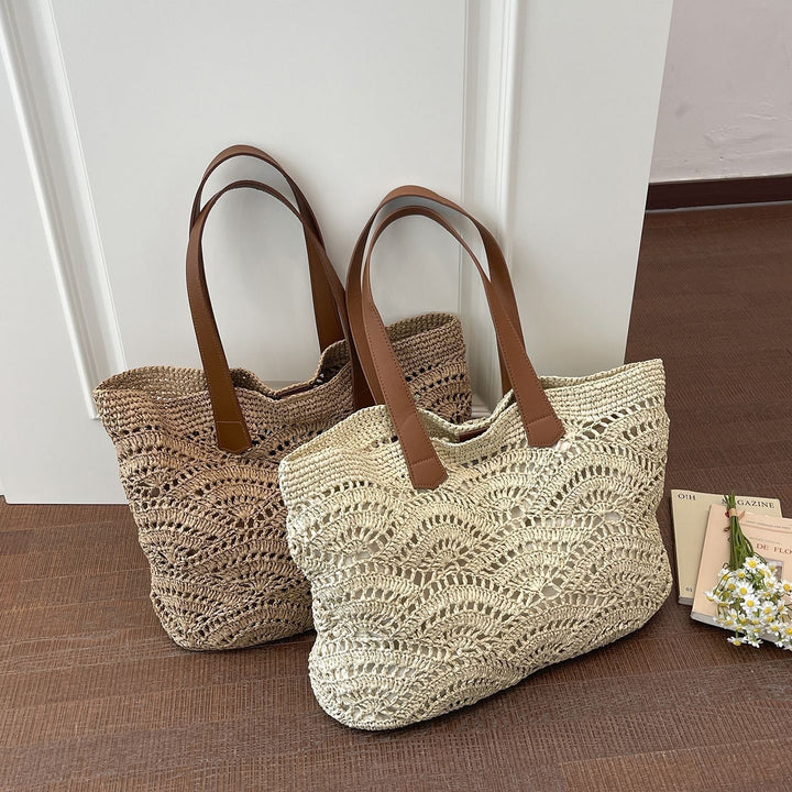 Handbag made of high-quality woven natural material with elegant leather handles Bowlift
