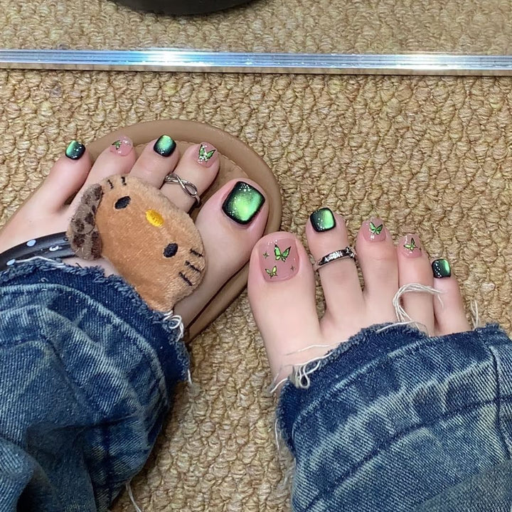Artistic toenails with detailed butterfly design Bowlift
