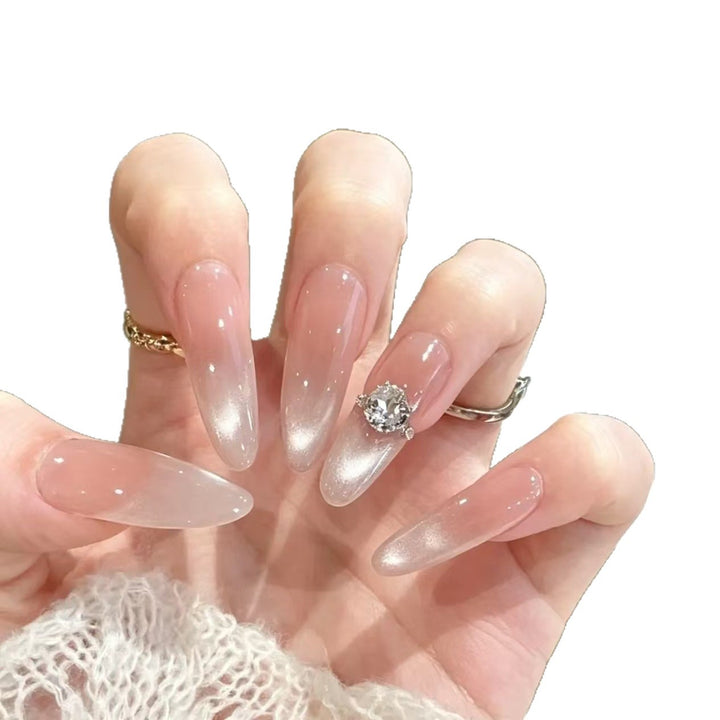 Elegant Stiletto Nail Extensions with Crystal Accent