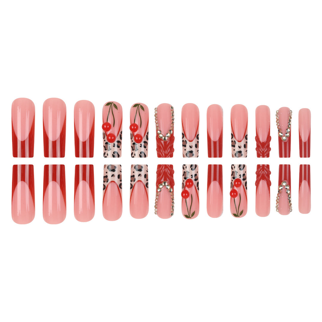 Artistic Long Press-On Nail Extensions with Decorative Accents Bowlift