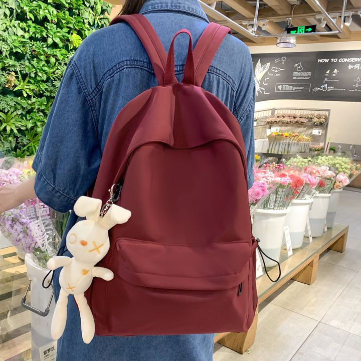 Multi-functional backpack with integrated keychain Bowlift