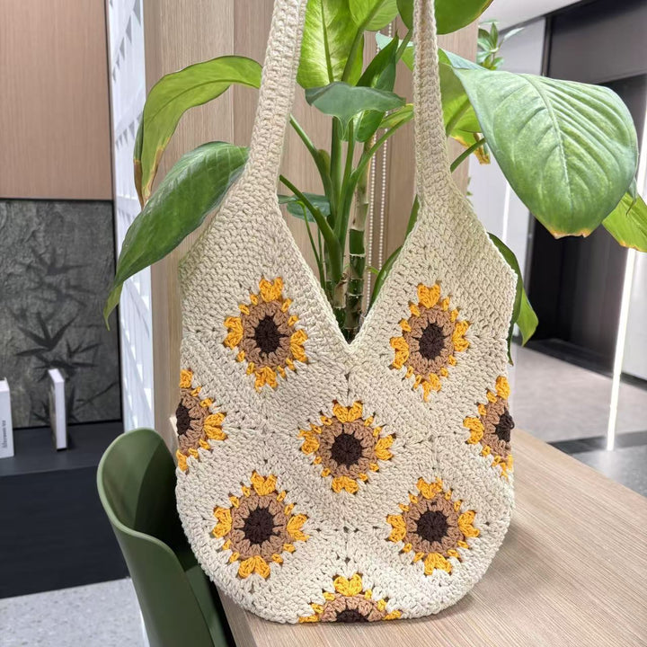 Hand-knotted shoulder bag with sunflower motif Bowlift