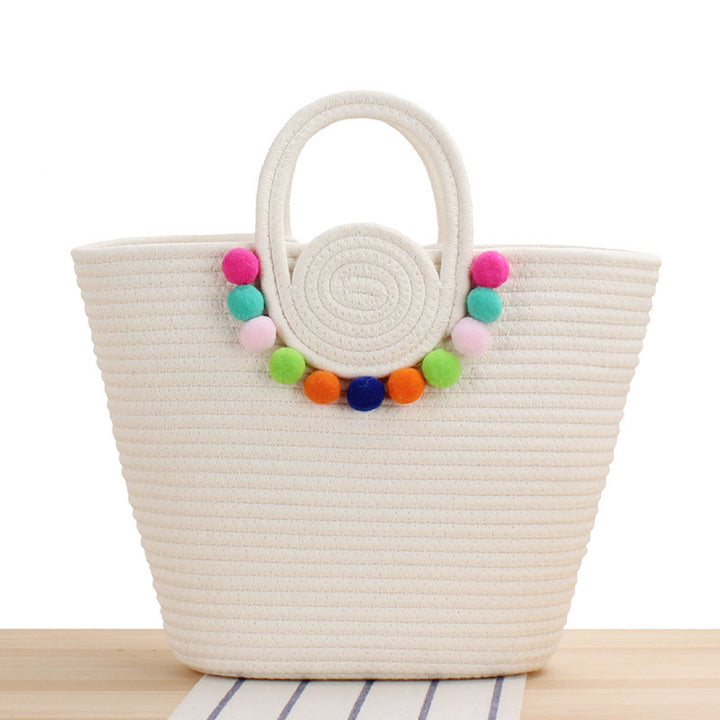 Playful beach bag with colorful pompom decor Bowlift