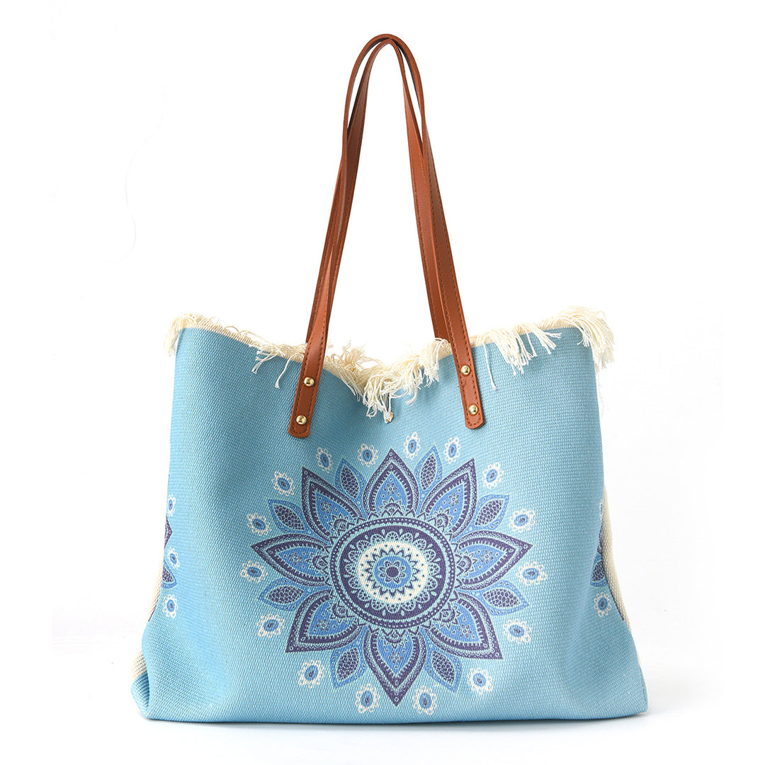 Beach bag with floral pattern and fringes Bowlift