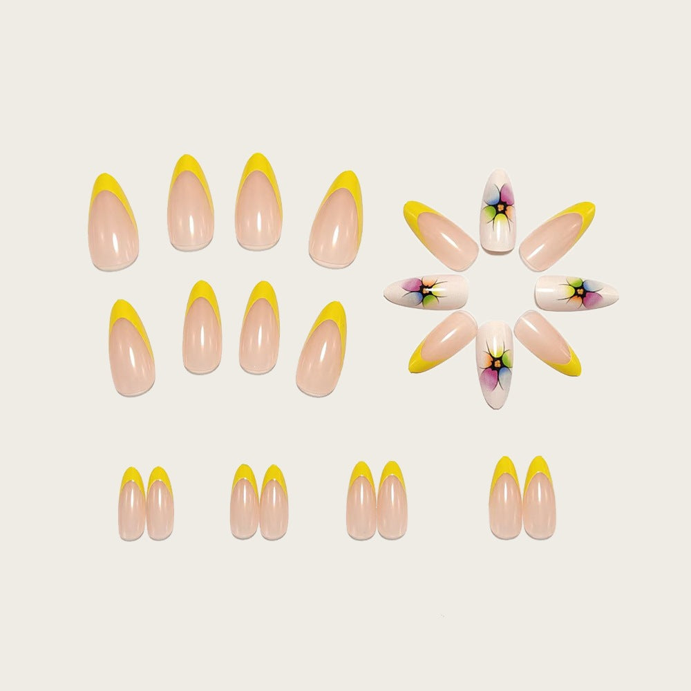 Artificial nails with colorful floral designs and striking color accents Bowlift