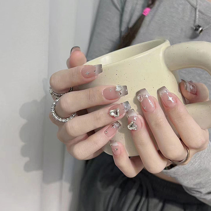 Acrylic nail set with sparkling crystal decorations Bowlift