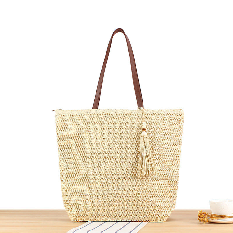 Handbag Made of Braided Natural Material with Tassel Decoration Bowlift