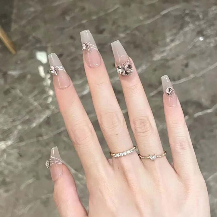 Art nail set with filigree decorations and glamorous accents Bowlift