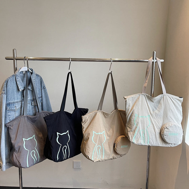 Tote bag with stylish cat design and generous storage space Bowlift