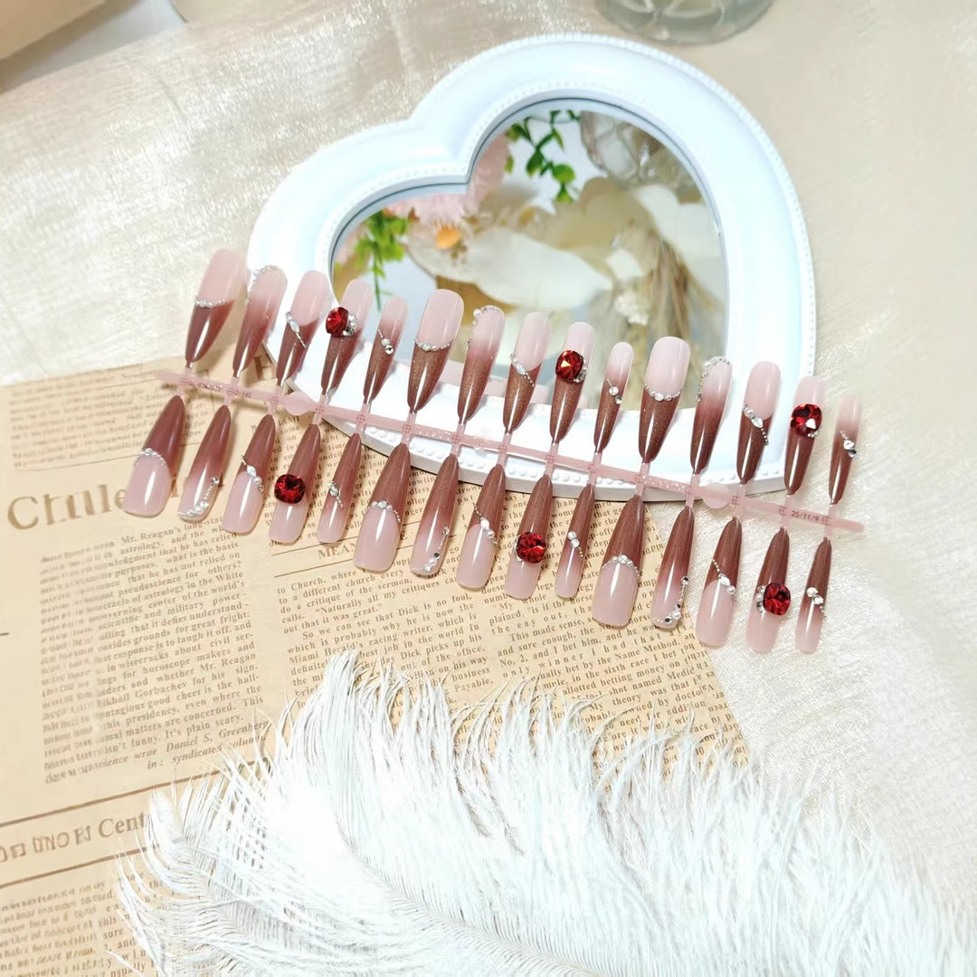 Artificial nails with luxurious 3D decorations and glamorous accents Bowlift