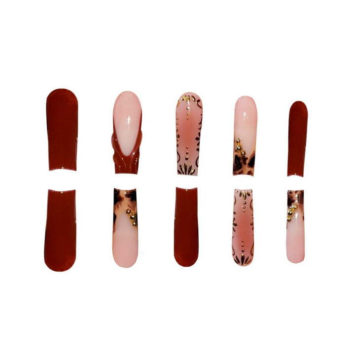 Artistic Long Press-On Nails with Elegant Gold Accents Bowlift