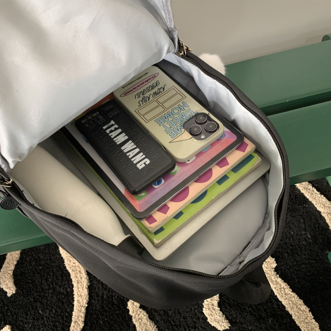 Practical backpack with colorful applications Bowlift