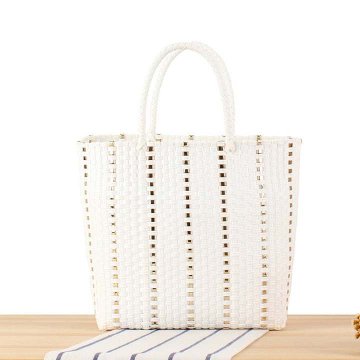 Fashionable basket bag with elegant accents Bowlift