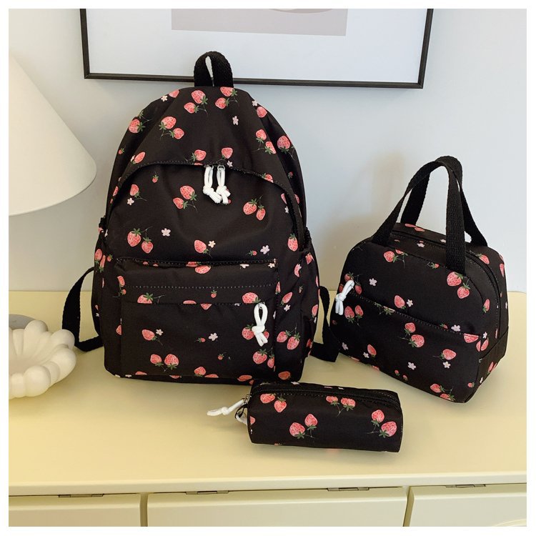Backpack set with cheerful strawberry pattern and practical compartments Bowlift