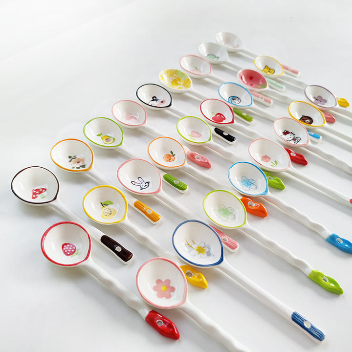 Ceramic soup spoon with lucky cat illustration and ergonomic long-handle Bowlift