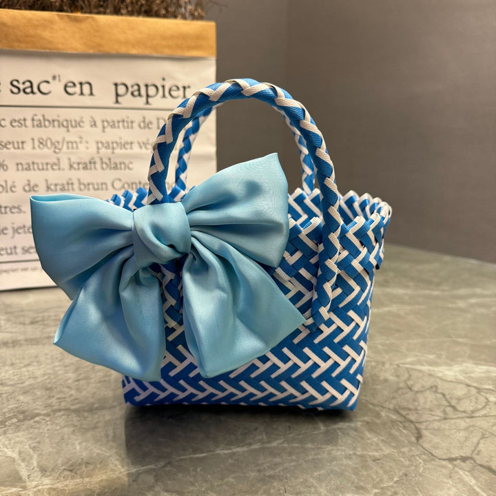 Playful basket bag with bow Bowlift