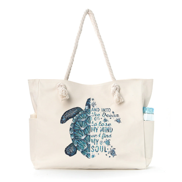 Beach bag with practical side pockets and robust design Bowlift
