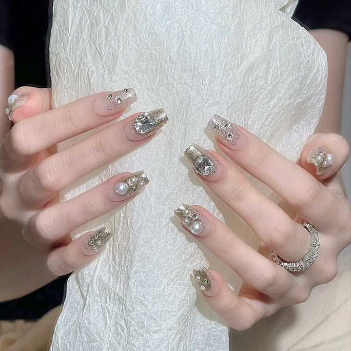 Artificial nail set with elegant pearl and glitter design Bowlift