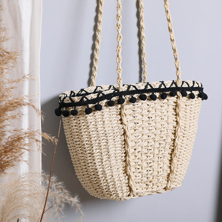 Delicate beach bag with pompons Bowlift