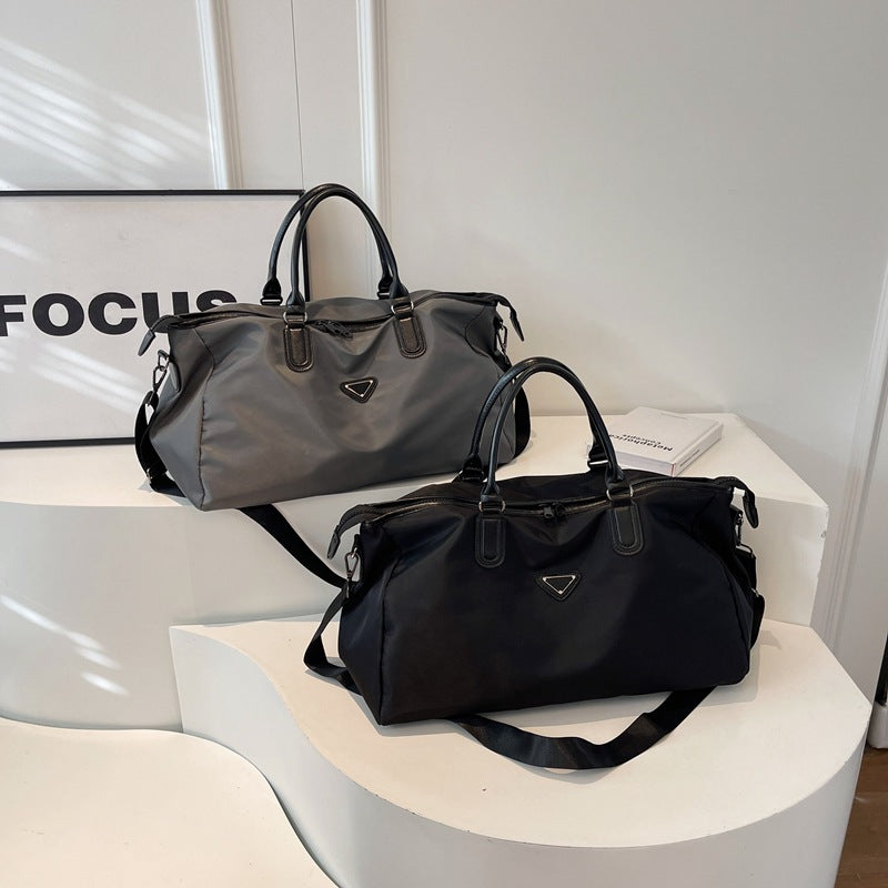 Practical sports and travel bag with versatile compartments Bowlift