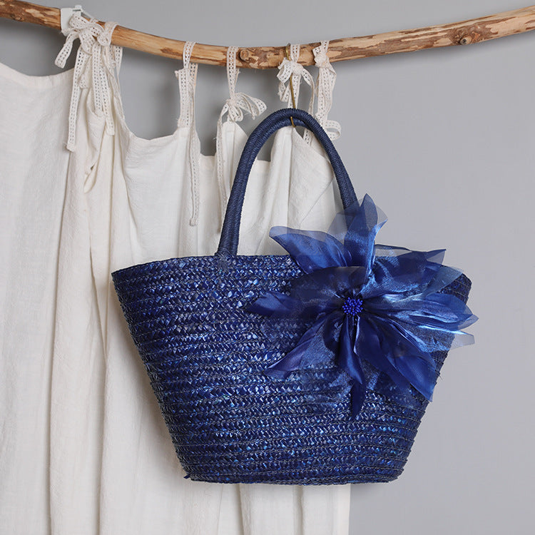 Stylish basket bag with eye-catching flower detail Bowlift