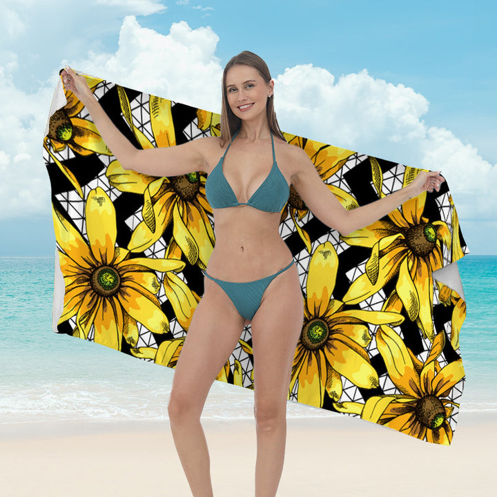 Beach towel with vibrant tropical plant motif Bowlift
