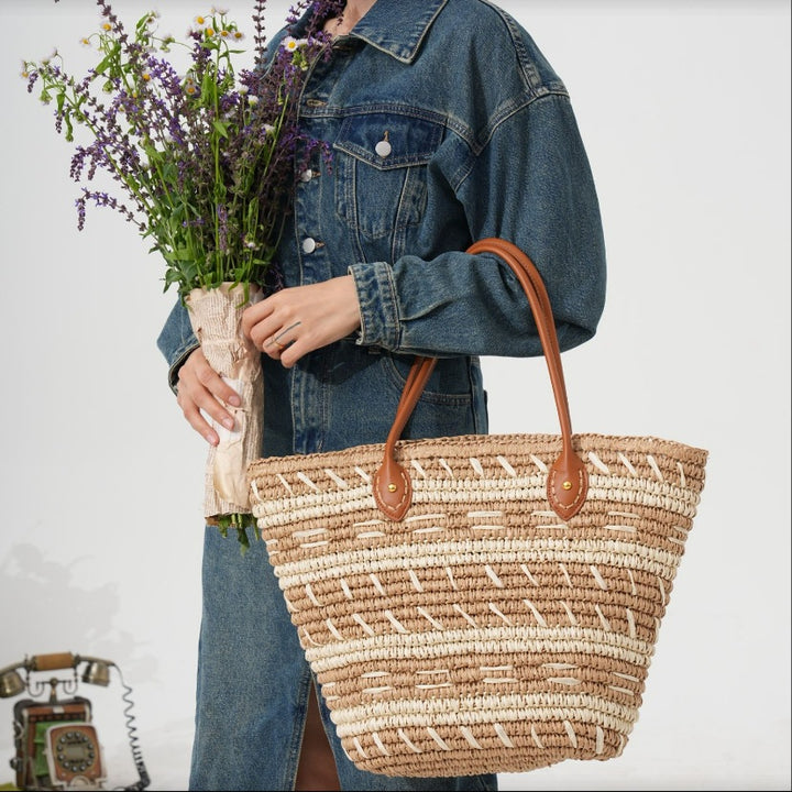 Decorative bast bag with sturdy leather handles Bowlift