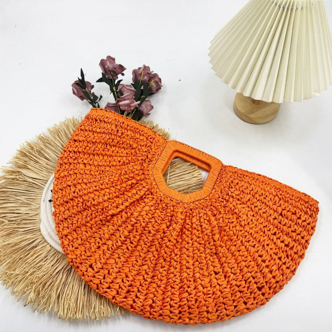 Designer Bast handbag with unique cut Bowlift