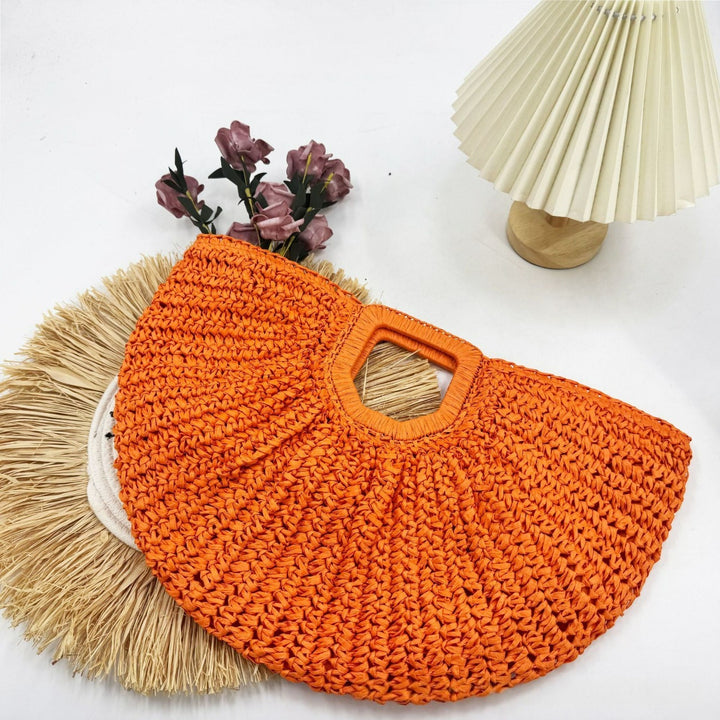 Designer Bast handbag with unique cut Bowlift