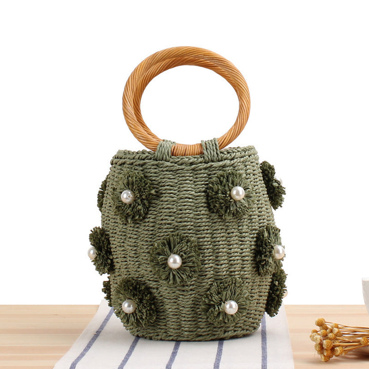 Handcrafted basket bag with bead appliqués Bowlift