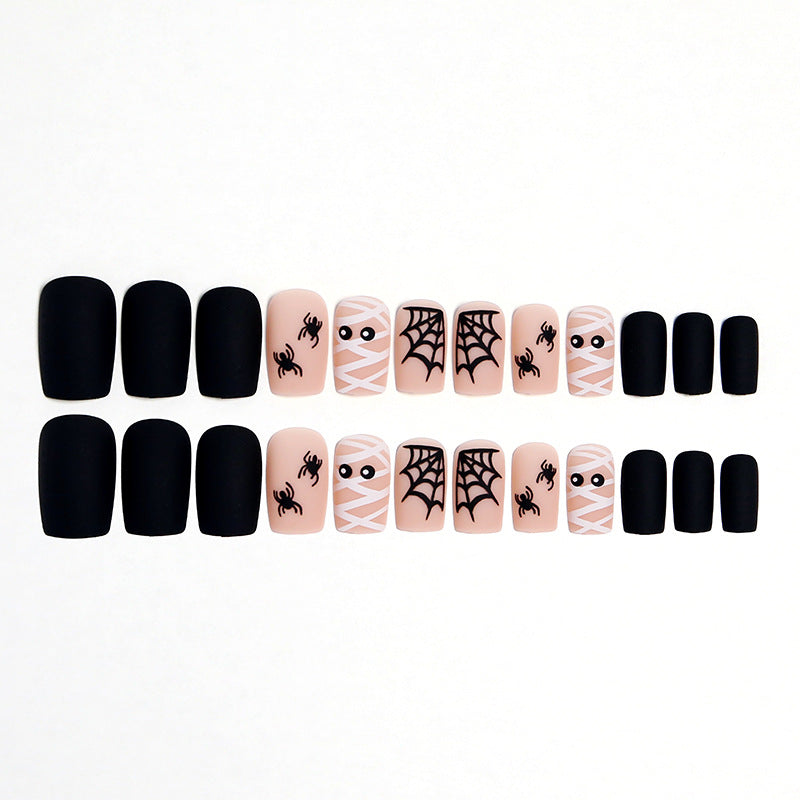 Artificial nail set with creepy Halloween motif and delicate spider designs Bowlift