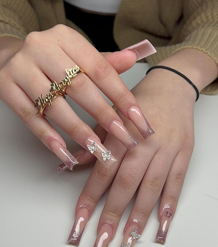 Artistic Long Glossy Almond-Shaped Nail Extensions Bowlift