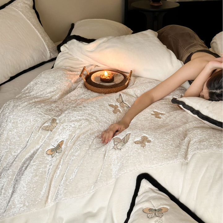 Luxurious velvet duvet cover set with embroidered pillows and contrast piping Bowlift