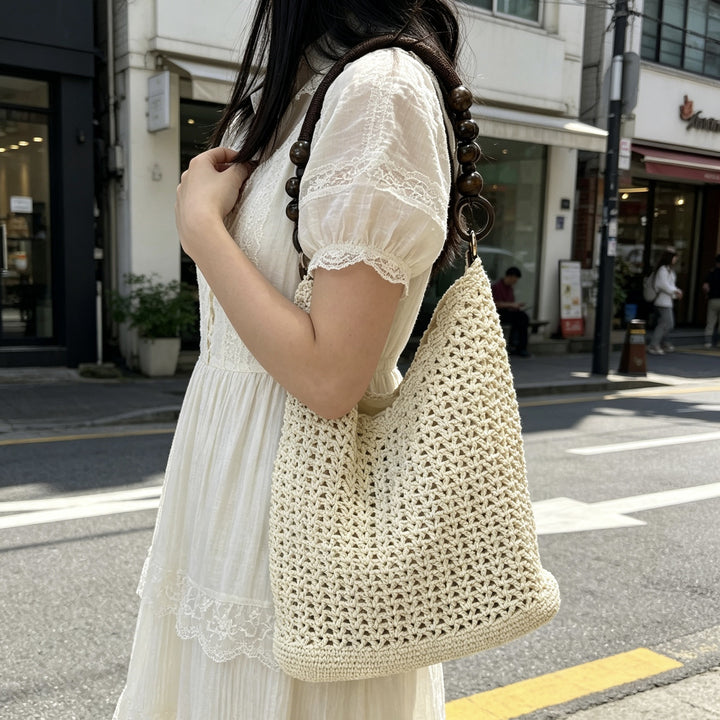 Hand-knotted bucket bag with wooden handles Bowlift