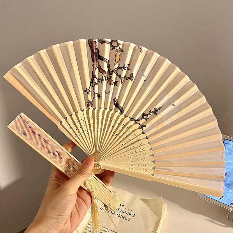 Handcrafted fan with elegant floral pattern Bowlift