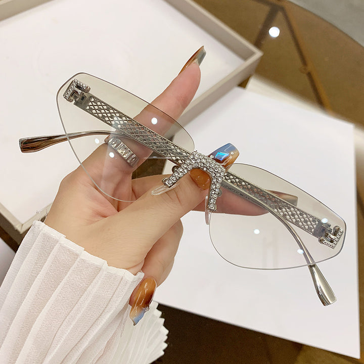 Women Designer Cat Eye Sunglasses with Sparkling Rhinestone Embellishment Bowlift