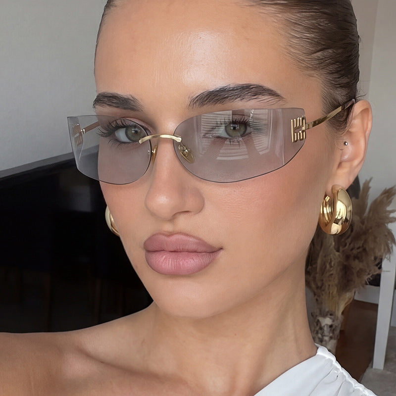 Women's futuristic designer sunglasses with unusual frame and UV protection Bowlift