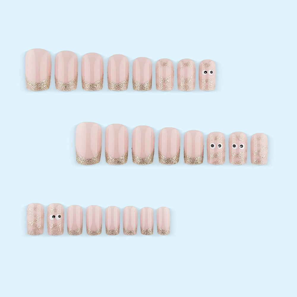 Artificials nails with playful eye design and glitter tips Bowlift