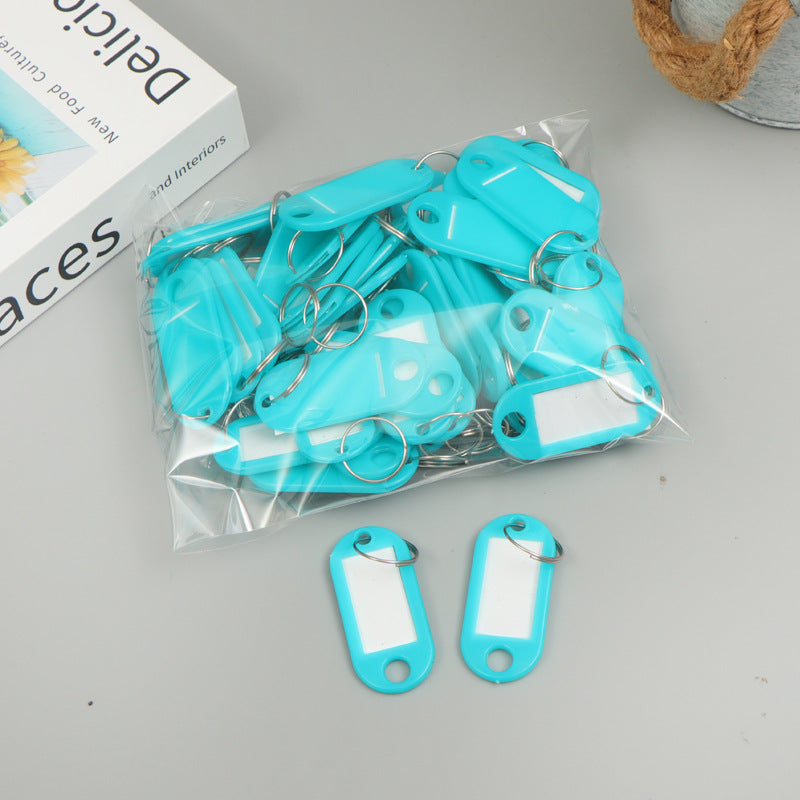 Unisex writable keychain with clear labeling field Bowlift