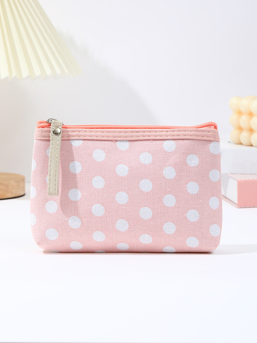 Canvas polka dot cosmetic pouch with zippered faux leather pull Bowlift