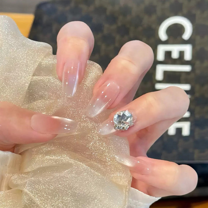 Elegant artificial nail tips with glitter accent Bowlift