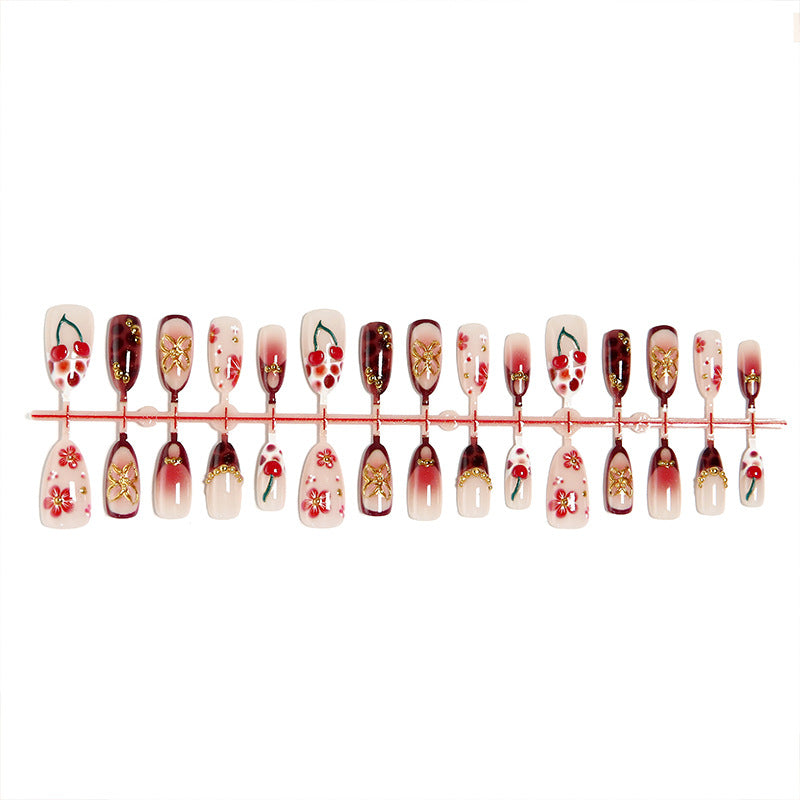 Artificial nail set with elegant floral designs and glitter effect Bowlift