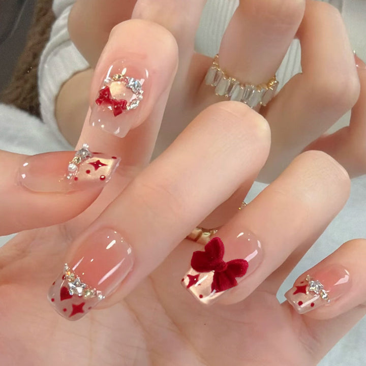 Glamorous artificial nail tips with 3D flower and crystal embellishments Bowlift