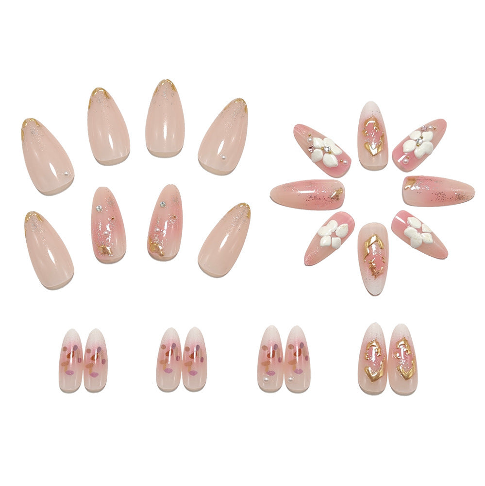 Art nail design with floral accents and glitter tips Bowlift