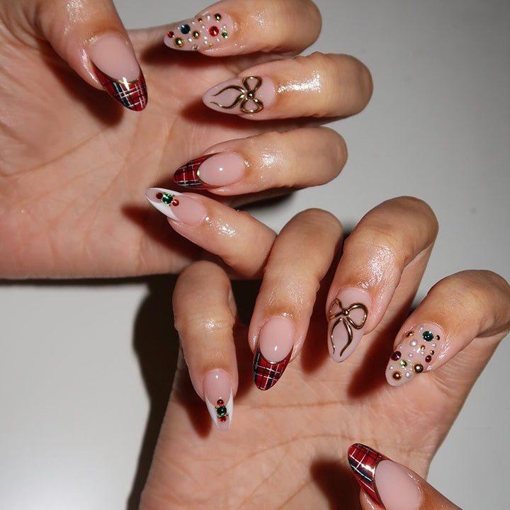 Artificial nail set with festive design and sparkling accents Bowlift
