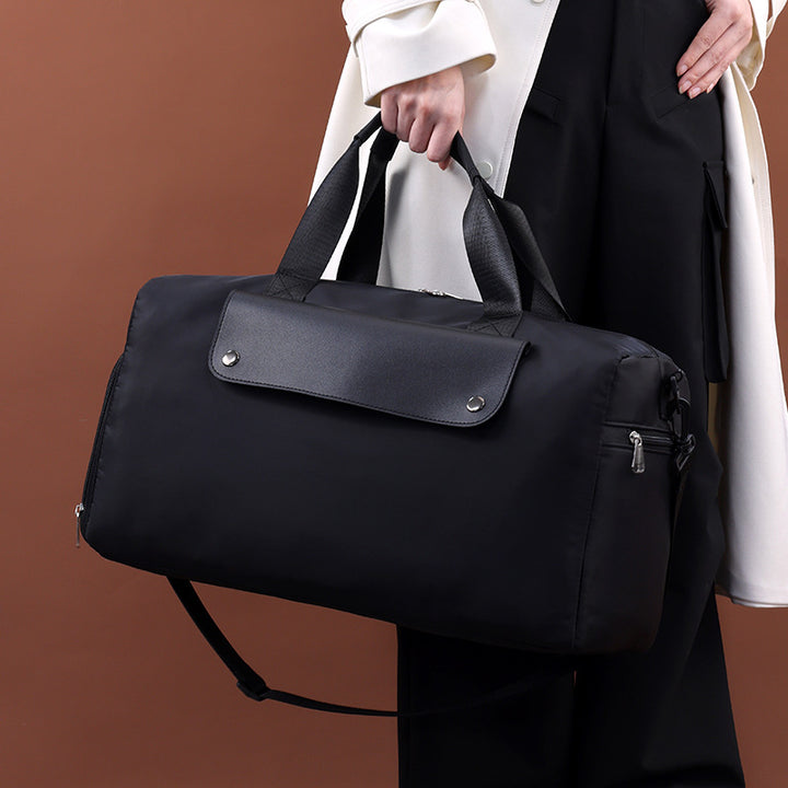 Travel bag with practical compartment design and detachable shoulder strap Bowlift