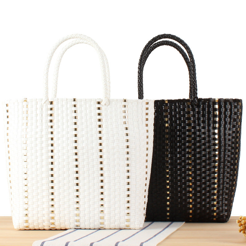 Fashionable basket bag with elegant accents Bowlift