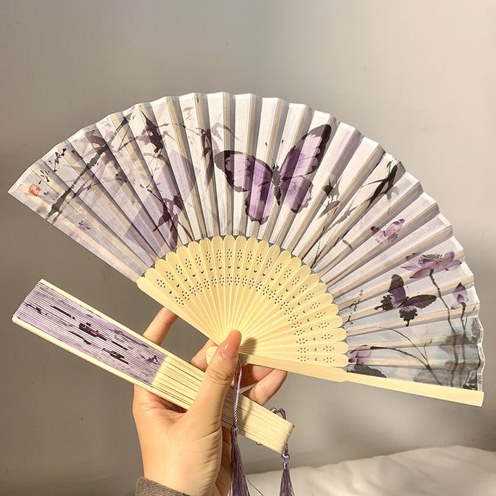 Elegant fan with elaborate butterfly motif Bowlift