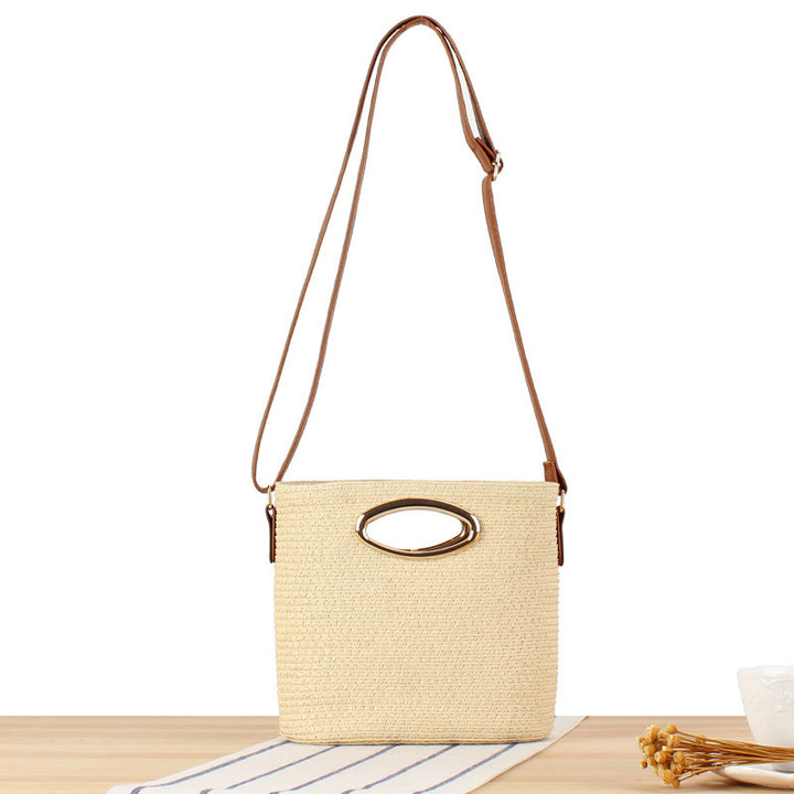 Shoulder bag made of handwoven natural material with elegant handle Bowlift